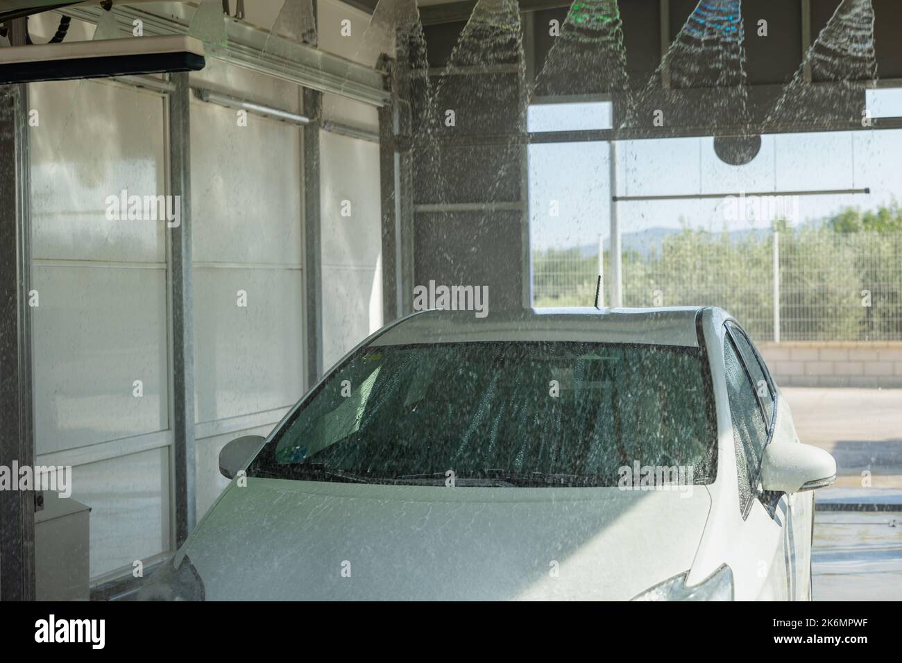 Car washing in automobile laundry Stock Photo Alamy