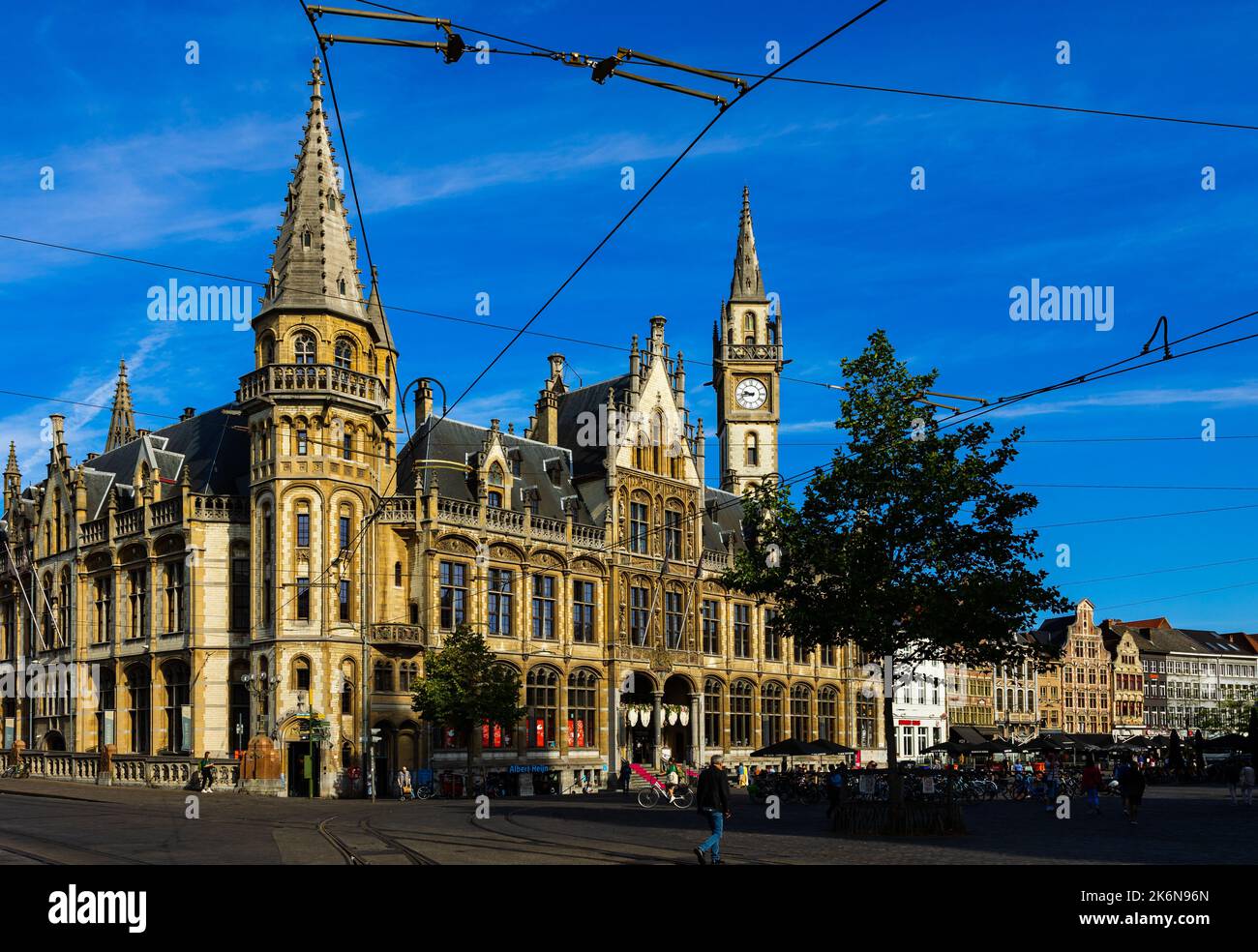 Impressive building of Old Post Office with clock tower in Belgian city