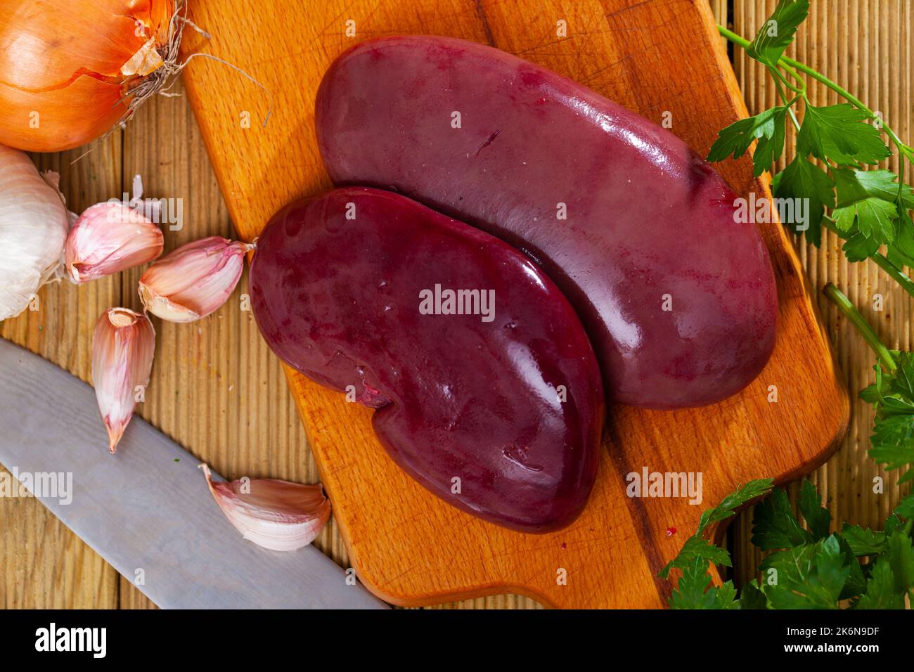 Raw pork kidneys Stock Photo Alamy