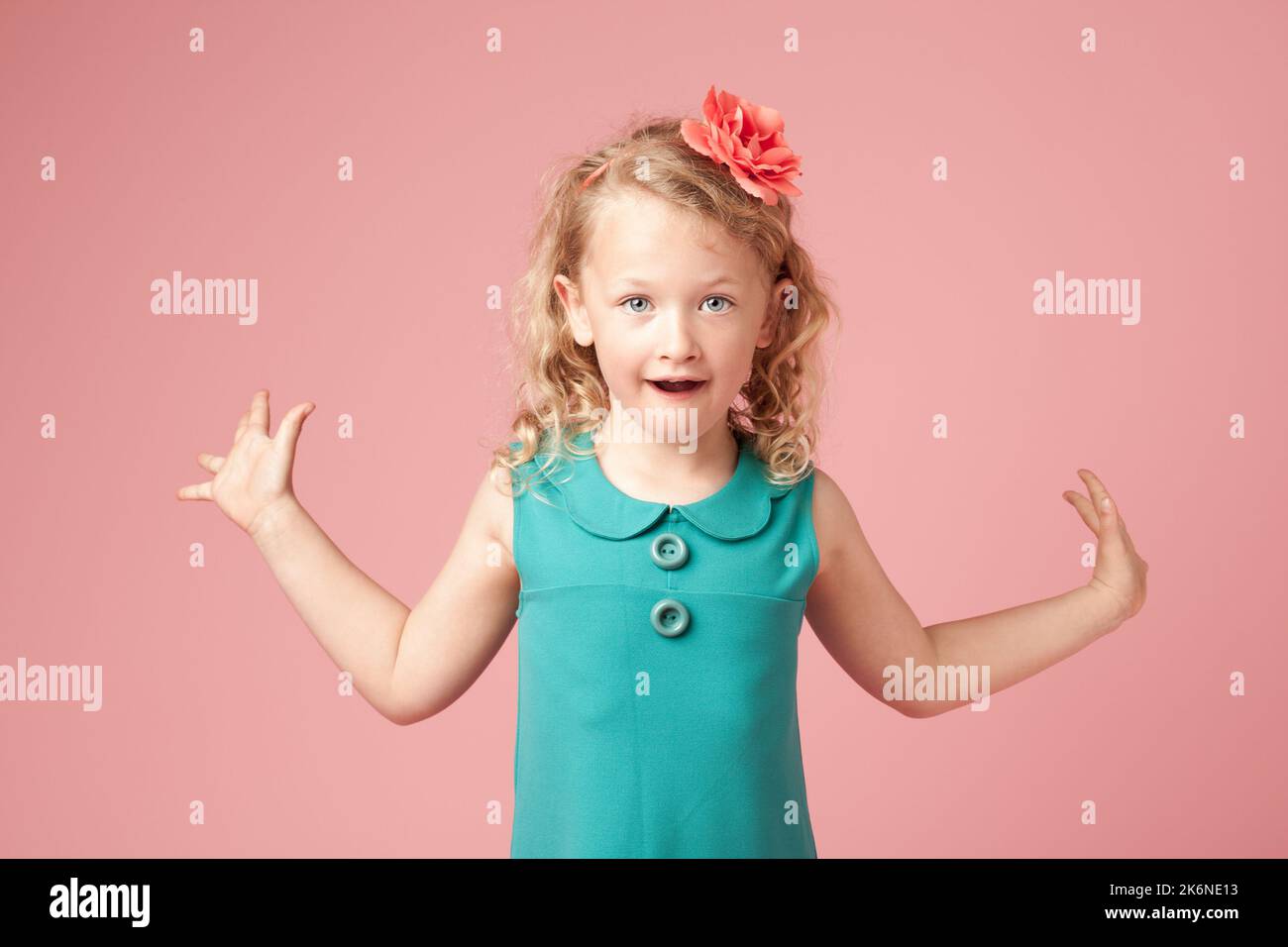 Surprises around every corner. a little girl looking shocked against a