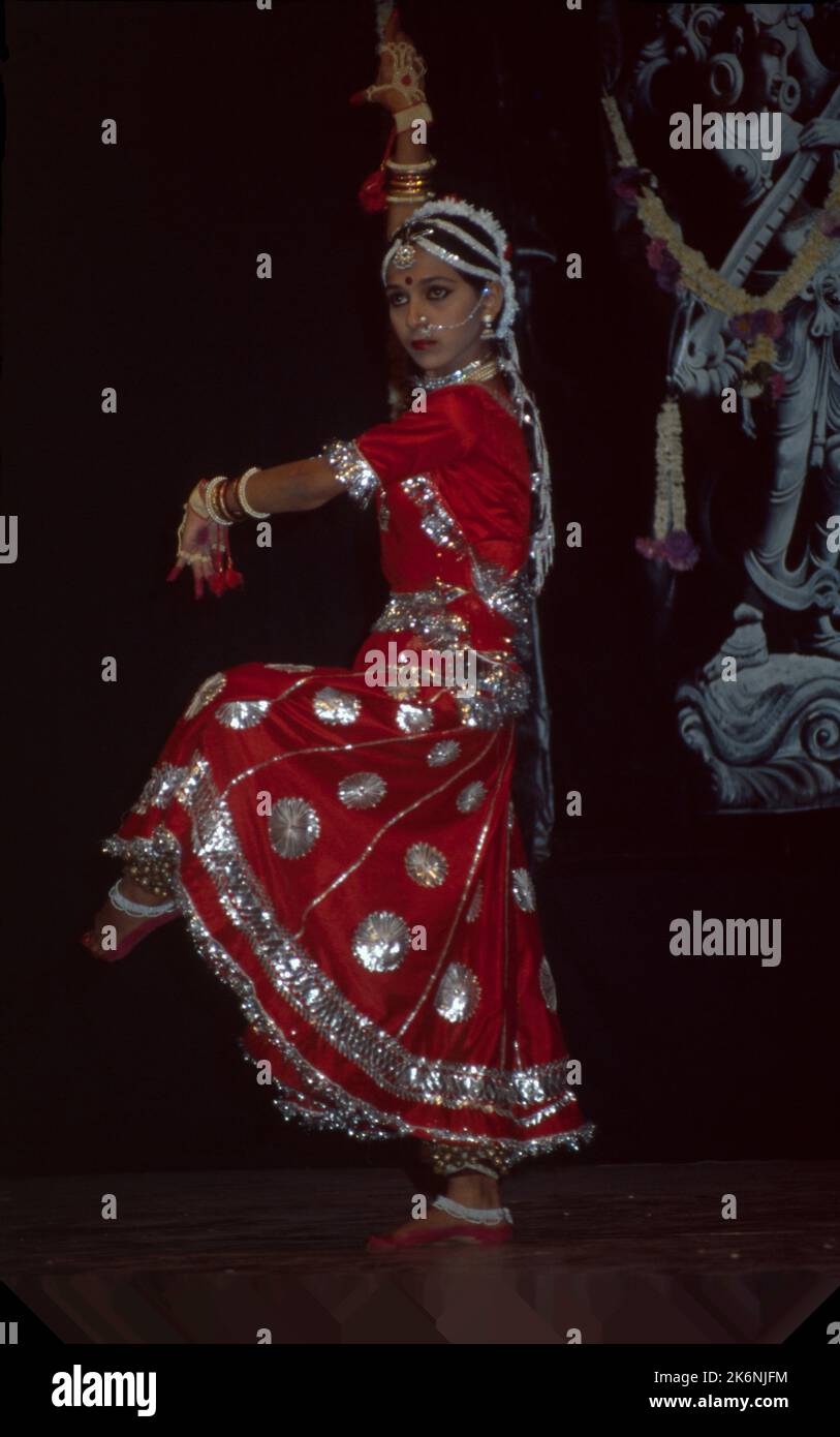 Kathak:- One of the main forms of Classical Dance Drama, It is indigenous to northern India and developed under the influence of both Hindu and Muslim Cultures. It is characterized by intricate foot work and pattern of controlling 100 ankle bells. Kathak is danced by both males and females many of dance conveys mood of Love. Stock Photo