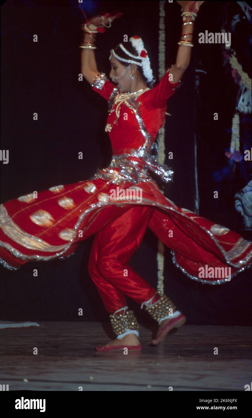 Kathak:- One of the main forms of Classical Dance Drama, It is indigenous to northern India and developed under the influence of both Hindu and Muslim Cultures. It is characterized by intricate foot work and pattern of controlling 100 ankle bells. Kathak is danced by both males and females many of dance conveys mood of Love. Stock Photo