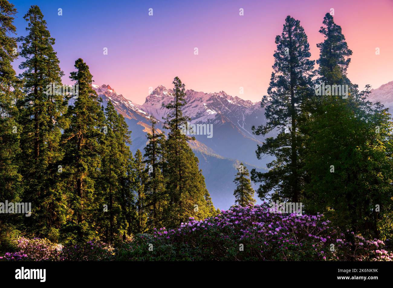 Sunrise in the mountain.  Scenic meadows of the Parvati valley Himalayan region. Peaks and alpine landscape on Sar Pass trek, Kasol, Himachal, India. Stock Photo