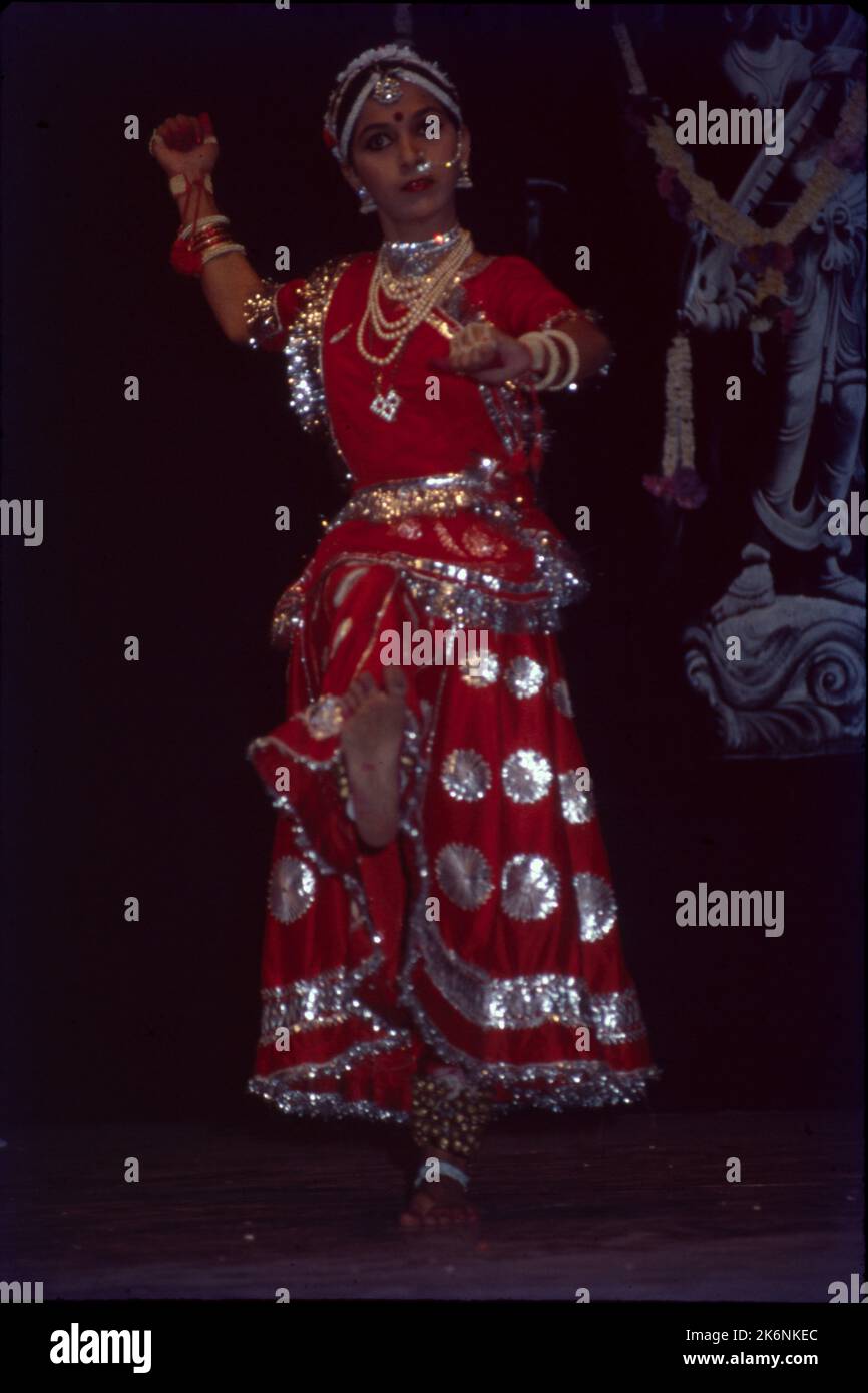 Kathak:- One of the main forms of Classical Dance Drama, It is indigenous to northern India and developed under the influence of both Hindu and Muslim Cultures. It is characterized by intricate foot work and pattern of controlling 100 ankle bells. Kathak is danced y both males and females many of dance conveys mood of Love. Stock Photo