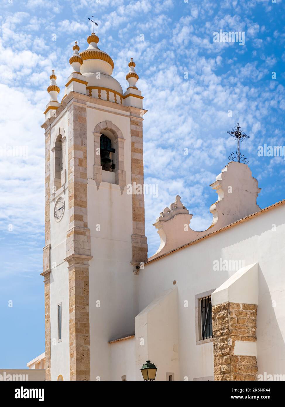 White baroque style bell tower of the church Igreja Matriz (Main Church), also known as Igreja de nossa Senhora da Conceição. Stock Photo
