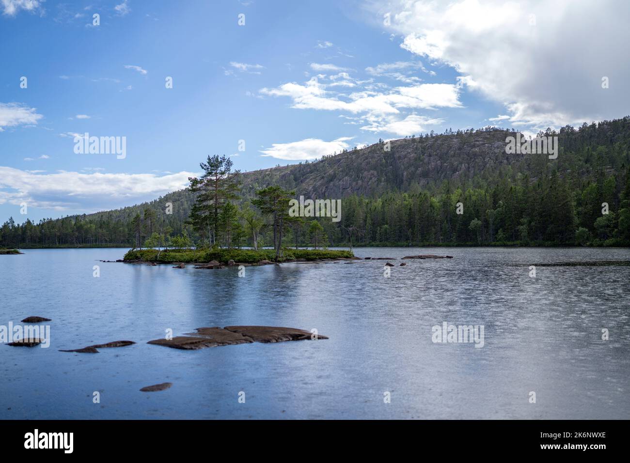 Serene and Reflecting Lake Tarnattvattnen Skuleskogen National Park Stock Photo