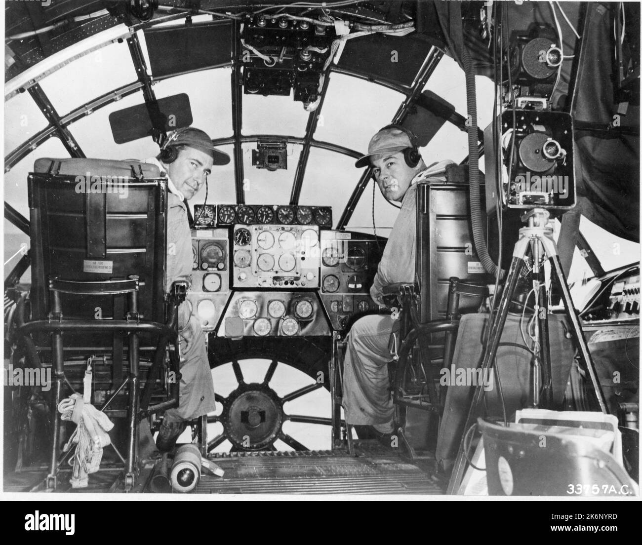 B.A. Erickson and Gus Green, Convair Pilots, at the Controls of a XB36