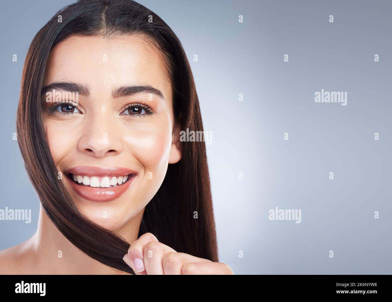 Portrait of a beautiful mixed race woman with clean skin and healthy ...