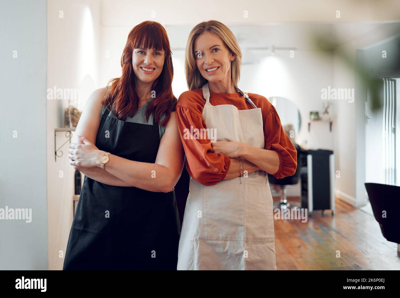 Hair salon, friends and portrait of happy hairdressers standing in their small business together. Happiness, smile and professional women hairstylists Stock Photo