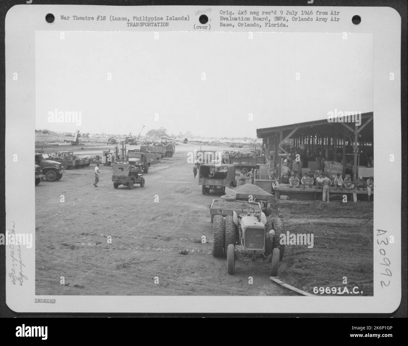 Equipment, destined for Japan, is loaded on tracks at the Air Transport