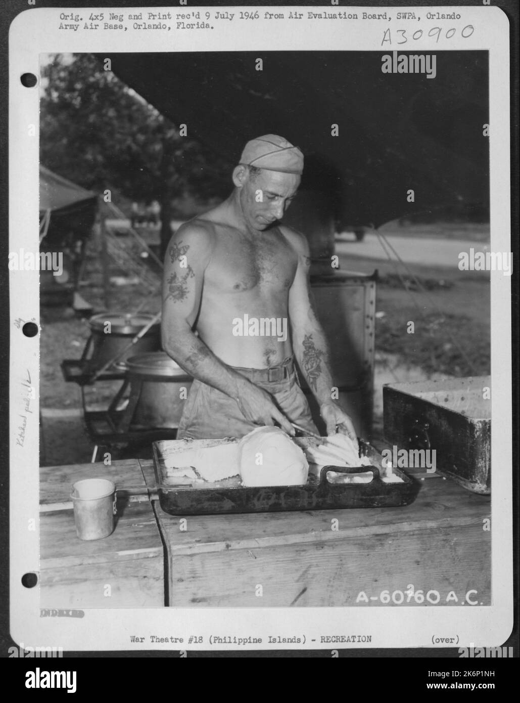Preparing food in an open field kitchen. Manila, Philippine Islands
