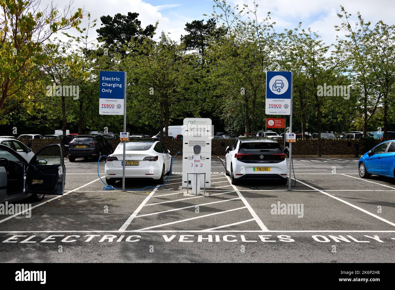 Electric charging cars when shopping at Tesco Store Stow on the Wold