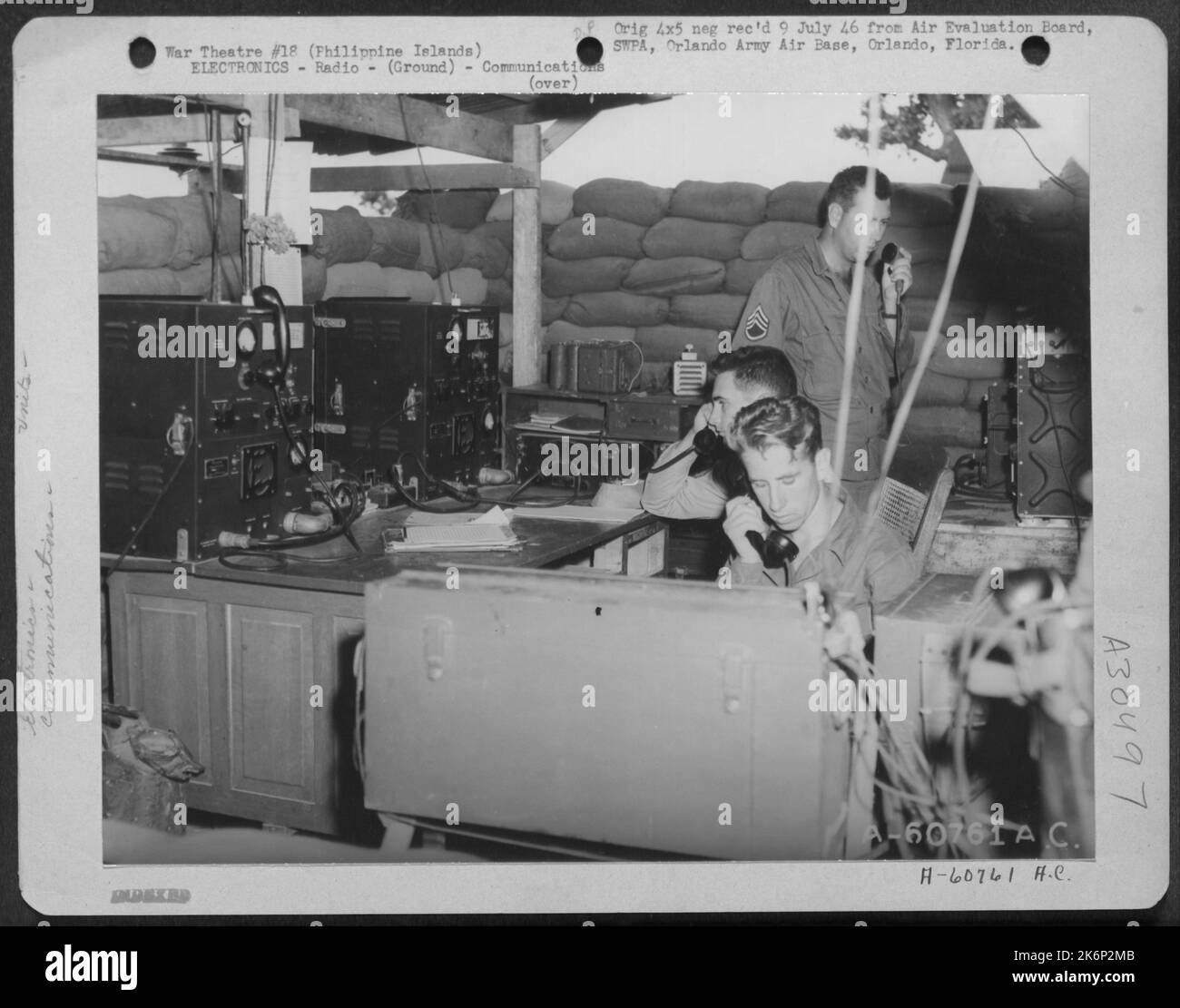 Radio room of the 507th AAA Command Post, Manila, Philippine Islands. Radio's are used during