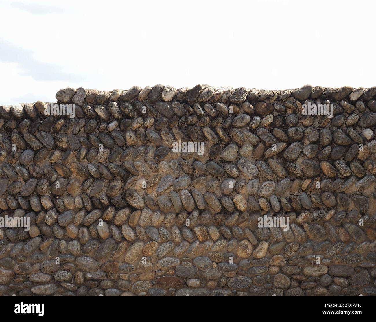 grey stone wall useful as a background Stock Photo - Alamy