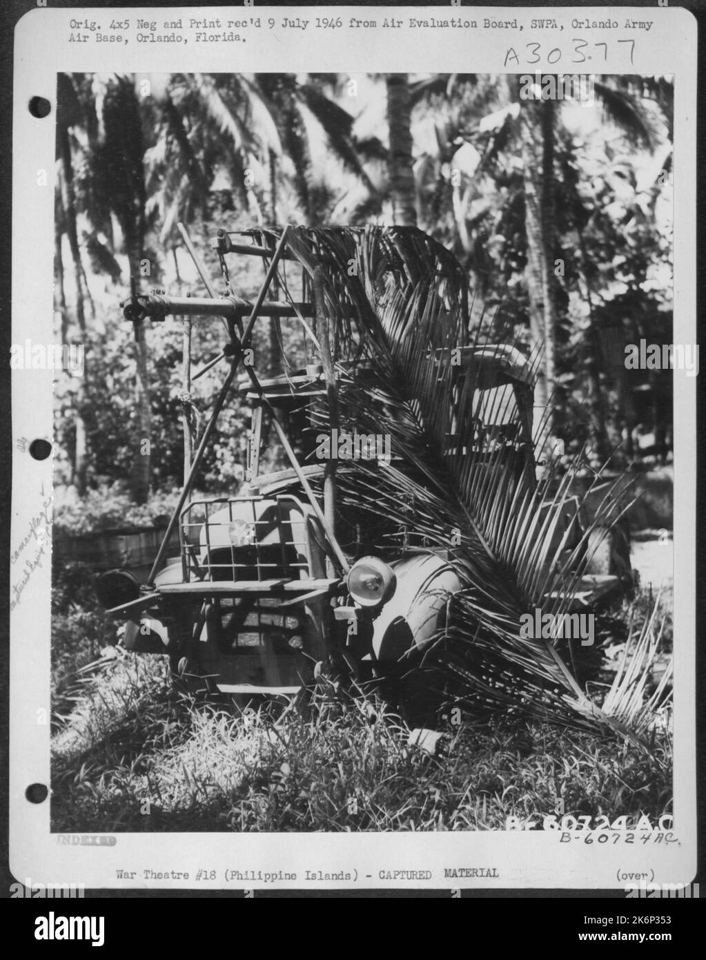 This Jap airdrome starter was found 50 ft. off the main road half-way between Bunawan and Tibungko, Mindanao, in the Philippine Islands. This view shows the crank head, which is attached to the hub of the propeller in starting a Jap plane. Some Stock Photo