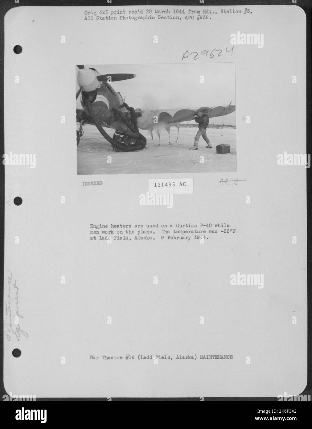 Engine Heaters Are Used On A Curtiss P40 While Men Work On The Plane