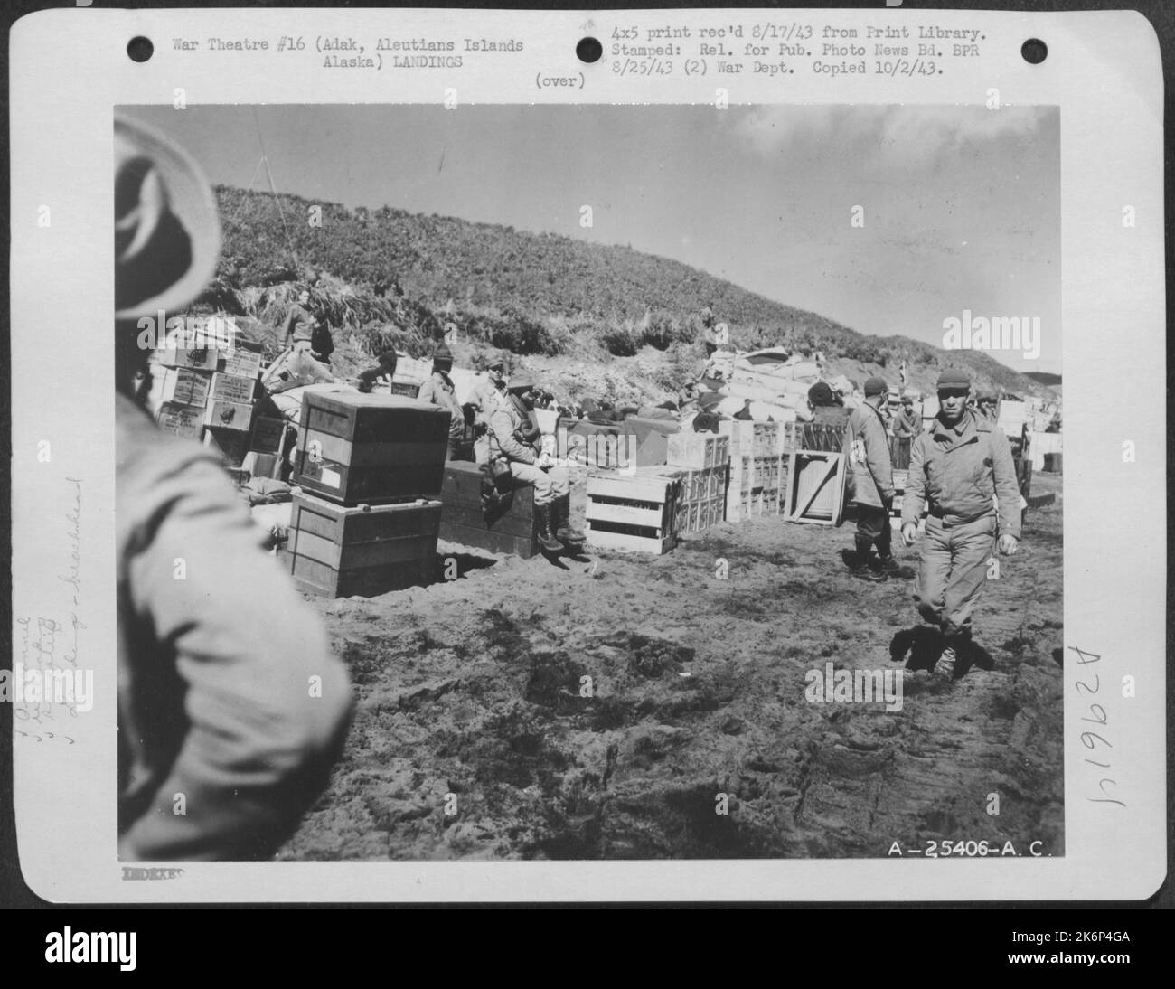 Brig. Gen. Landrum watches unloading of supplies at Adak, Aleutian Islands, Alaska. August 1942. Stock Photo