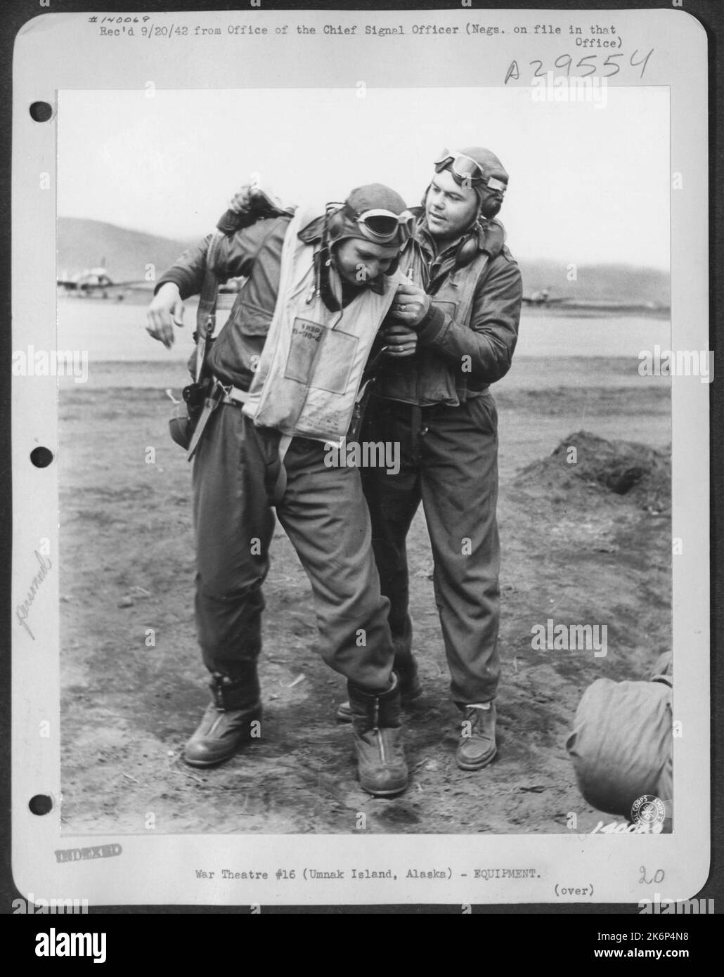 Lt's W.E. Brinkemann and M.S. Feltz help each other with their flying