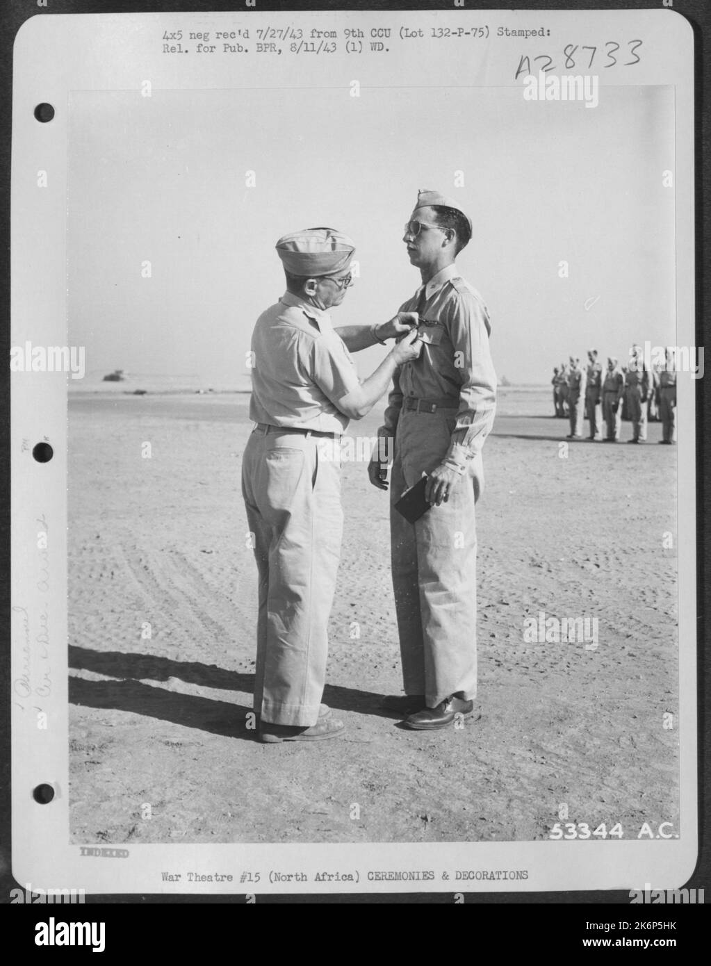 AFRICACapt. Gilmer E. Mayfield, Las Cruces, New Mexico, receiving the