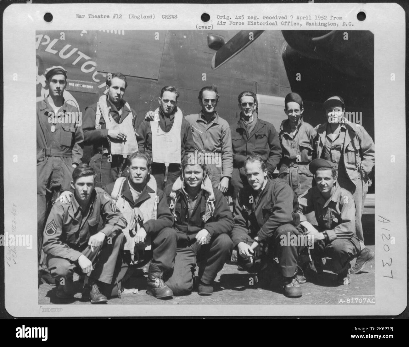 crew-members-of-the-753rd-bomb-squadron-458th-bomb-group-pose-beside