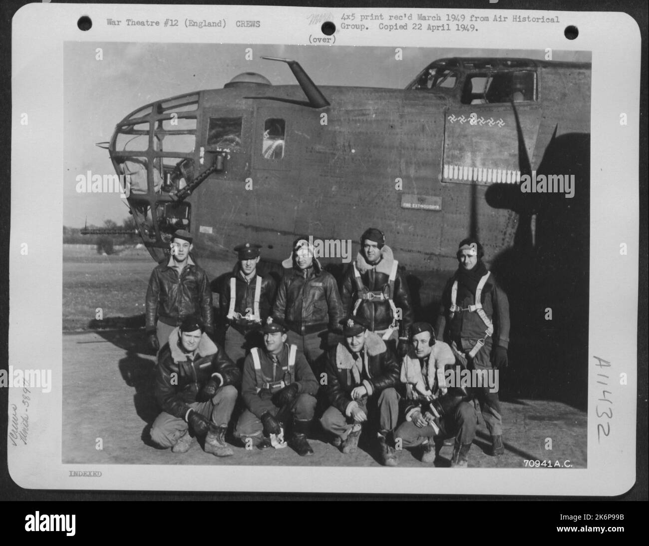 Combat Crew Of The 389Th Bomb Group Pose Beside A Consolidated B24