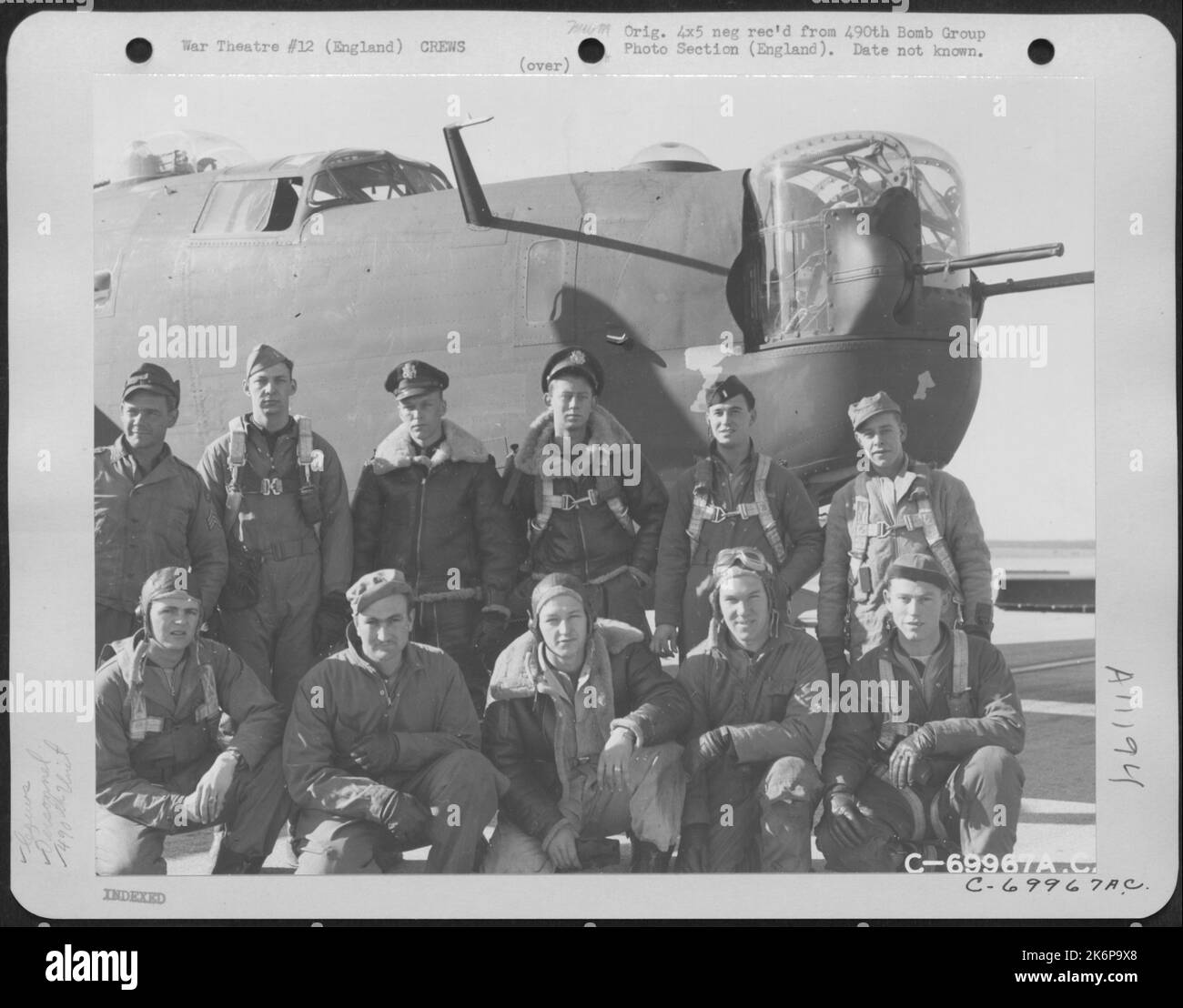 Lt. Bullard And Crew Of The 490Th Bomb Group Pose Beside Their