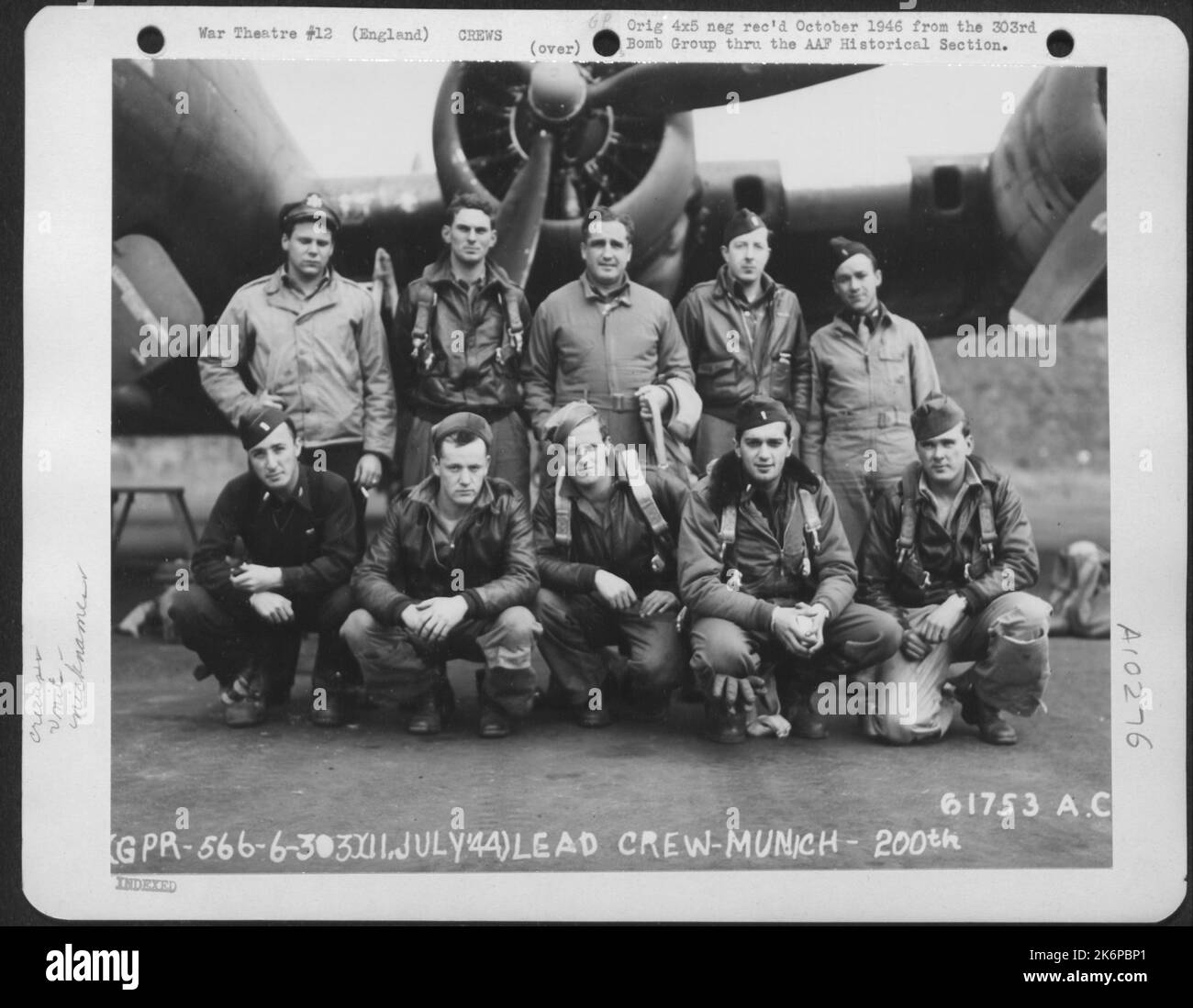 Lead Crew On Bombing Mission To Munich, Germany, Beside A Boeing B-17, 'Flying Fortress' 'Hell's Angels' After Completion Of Its 200Th Mission. 303Rd Bomb Group. England, 11 July 1944. Stock Photo
