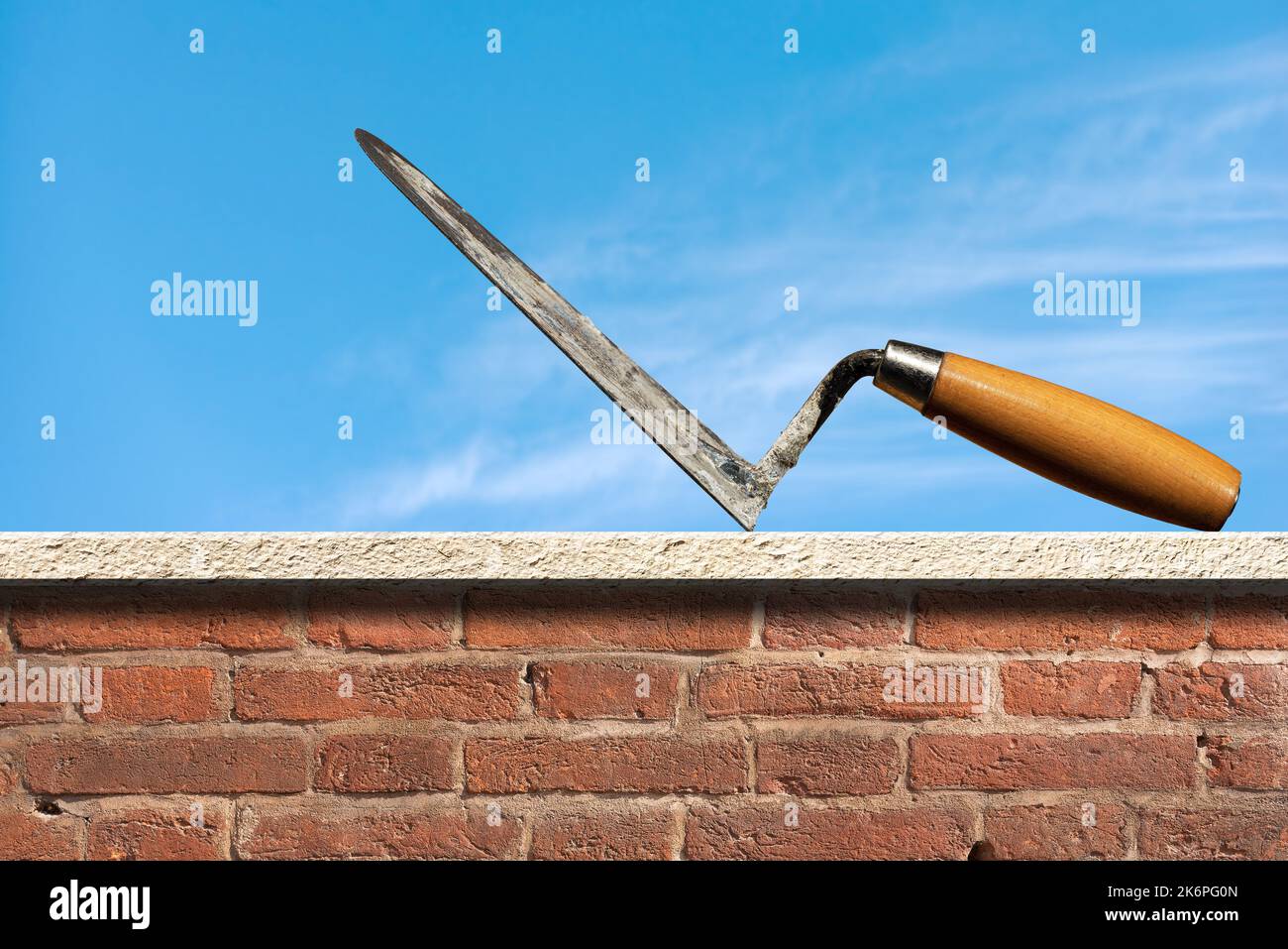 Red cement mix and trowel on the construction site Stock Photo - Alamy