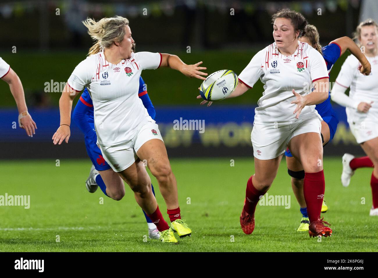England's Marlie Packer offloads to Amy Cokayne (right)during the Women ...