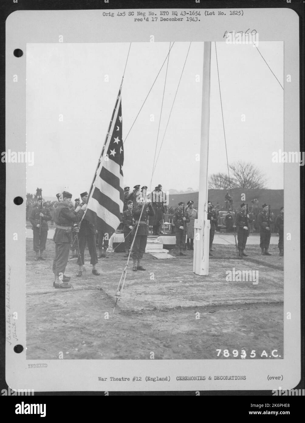 The American Flag Is Raised During A Ceremony Tranferring A British Airfield To The 8Th Air Force Service Command In Bushey Park, Teddington, England. 22 February 1943. Stock Photo