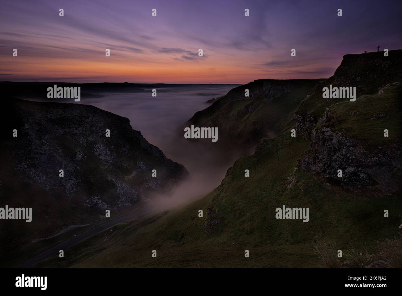 Hope valley cloud inversion at dawn blue hour from Winnats Pass