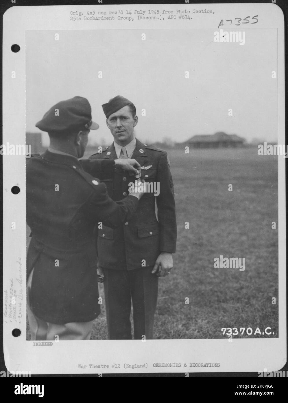 Sgt. L.E. Rider Of The 652Nd Weather Reconnaissance Squadron, 25Th Weather Reconnaissance Group Is Presented The Air Medal At An 8Th Air Force Base In England. 10 June 1944. Stock Photo