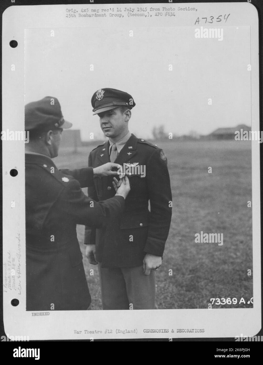 Lt. H. Roberson Of The 652Nd Weather Reconnaissance Squadron, 25Th Weather Reconnaissance Group Is Presented The Air Medal At An 8Th Air Force Base In England. 10 June 1944. Stock Photo
