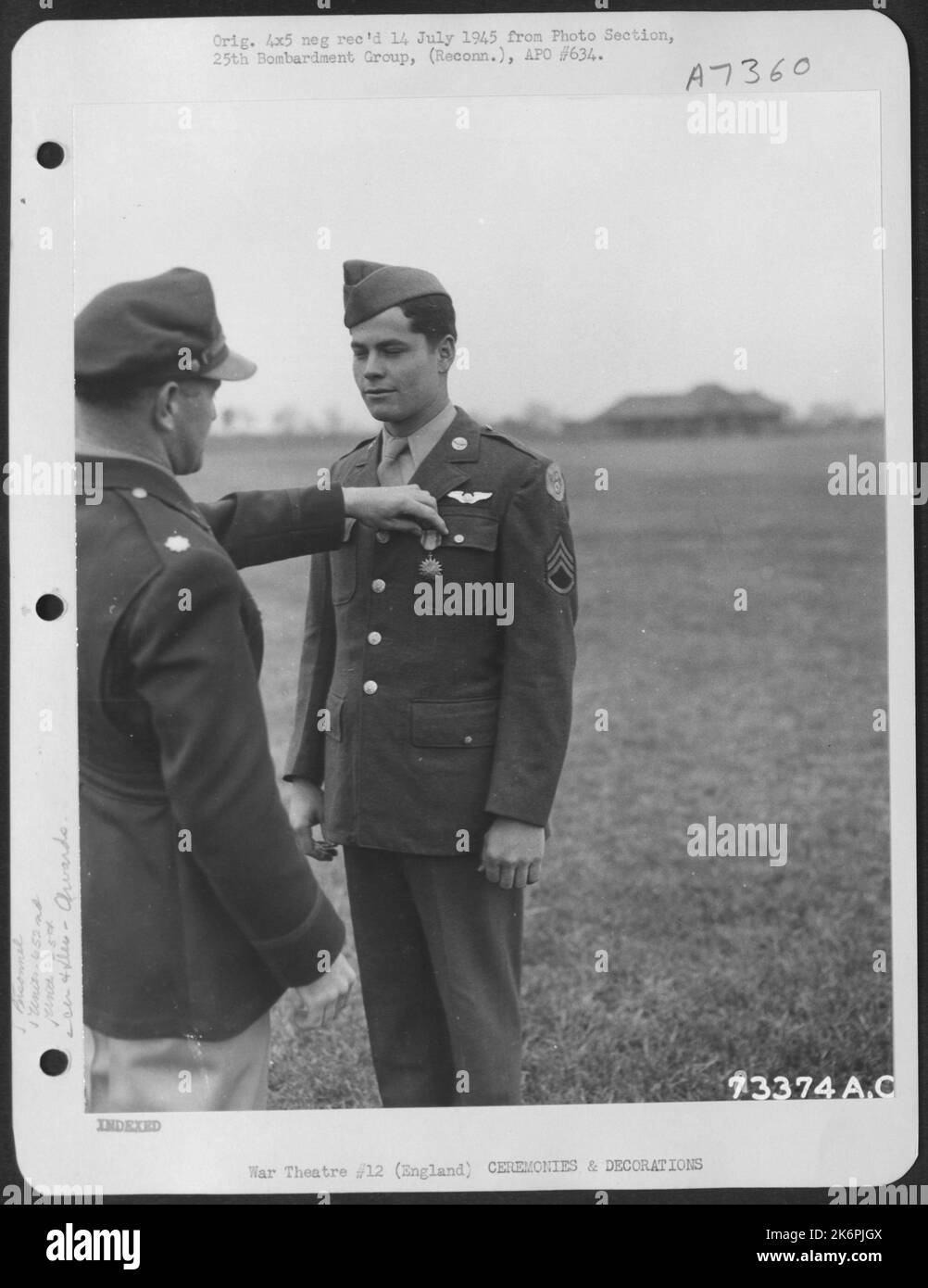 S/Sgt. T.J. Moorer Of The 652Nd Weather Reconnaissance Squadron, 25Th Weather Reconnaissance Group, Is Presented The Air Medal At An 8Th Air Force Base In England. 10 June 1944. Stock Photo