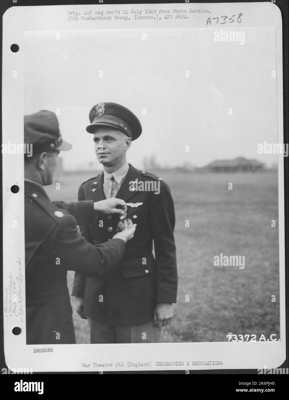 Lt. E.H. Ownbey Of The 652Nd Weather Reconnaissance Squadron, 25Th Weather Reconnaissance Group, Is Presented The Air Medal At An 8Th Air Force Base In England. 10 June 1944. Stock Photo