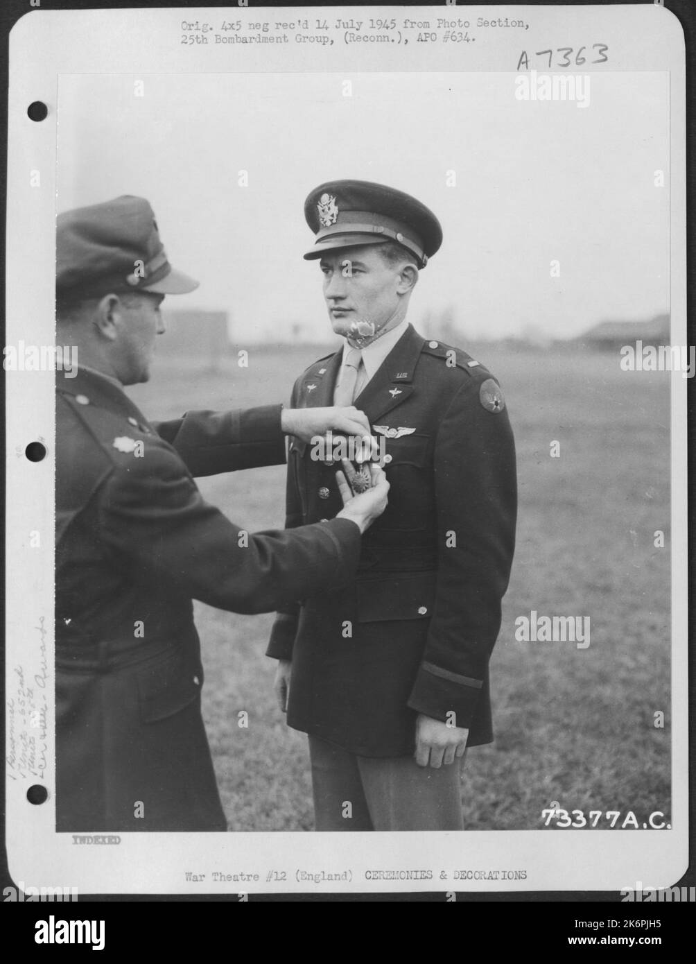 Lt. A.R. Kratz, Of The 652Nd Weather Reconnaissance Squadron, 25Th Weather Reconnaissance Group, Is Awarded The Air Medal At An 8Th Air Force Base In England. 10 June 1944. Stock Photo