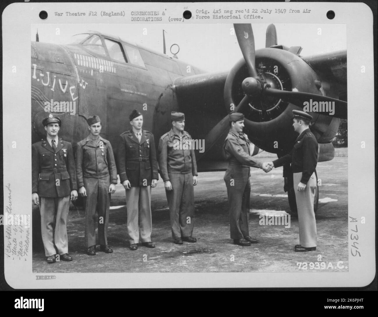 With The Douglas A-20 'G.I. Jive' As A Background, An Air Force Officer Presents The Air Medal To Members Of The 644Th Bomb Squadron, 410Th Bomb Group At A 9Th Air Force Base In England. 2 August 1944. Stock Photo