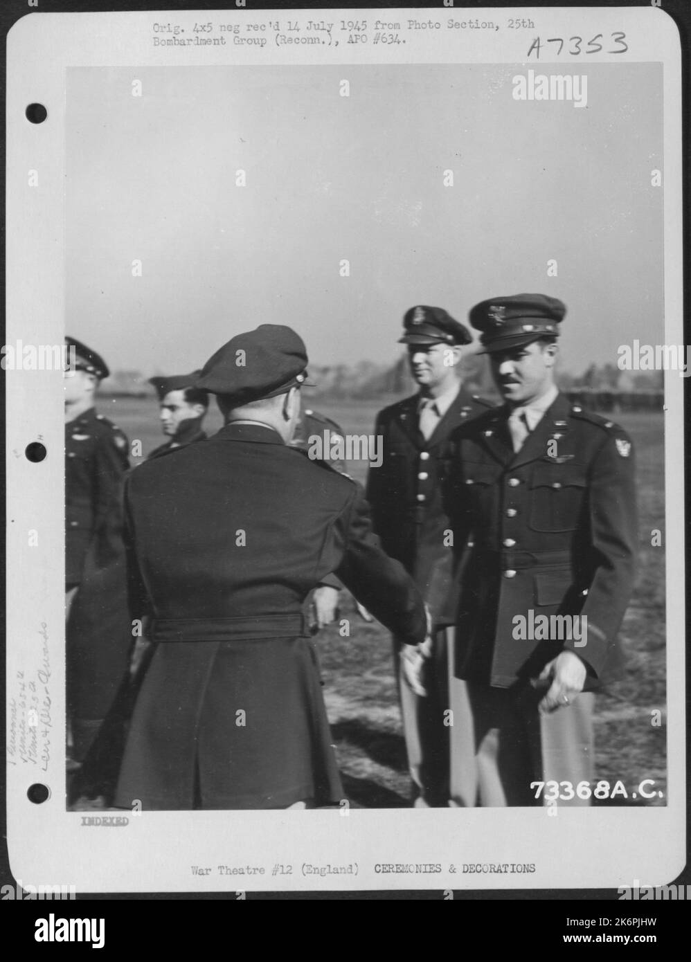 Lt. Hackman Of The 654Th Weather Reconnaissance Squadron, 25Th Weather Reconnaissance Group Is Congratulated After Receiving The Air Medal At An 8Th Air Force Base In England. 10 June 1944. Stock Photo