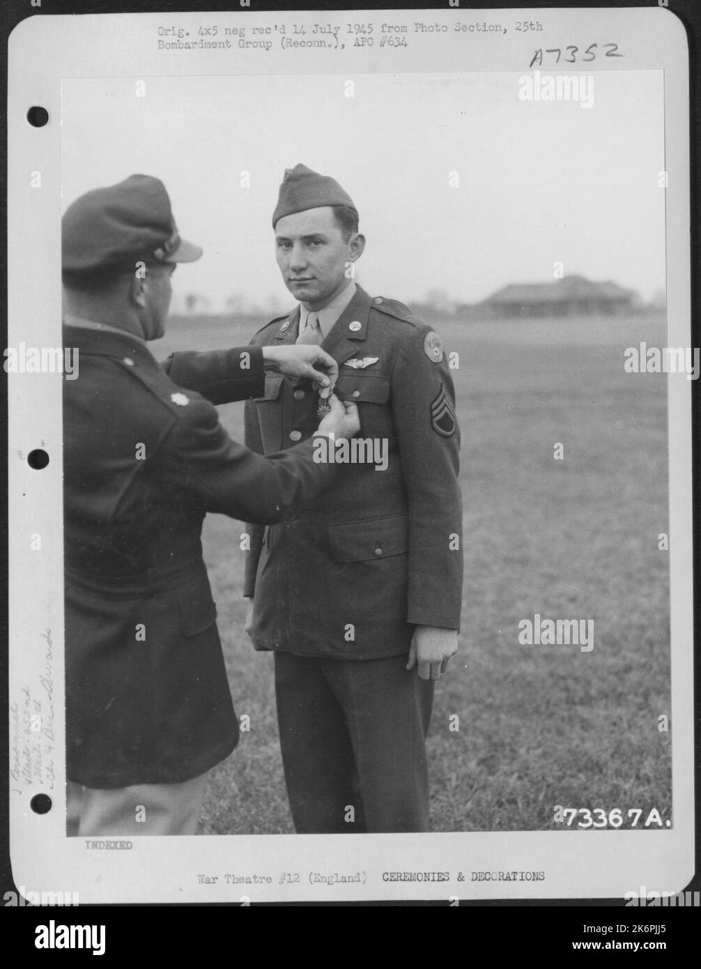 S/Sgt. G.A. Stransky Of The 652Nd Weather Reconnaissance Squadron, 25Th Weather Reconnaissance Group Is Presented The Air Medal At An 8Th Air Force Base In England. 10 June 1944. Stock Photo