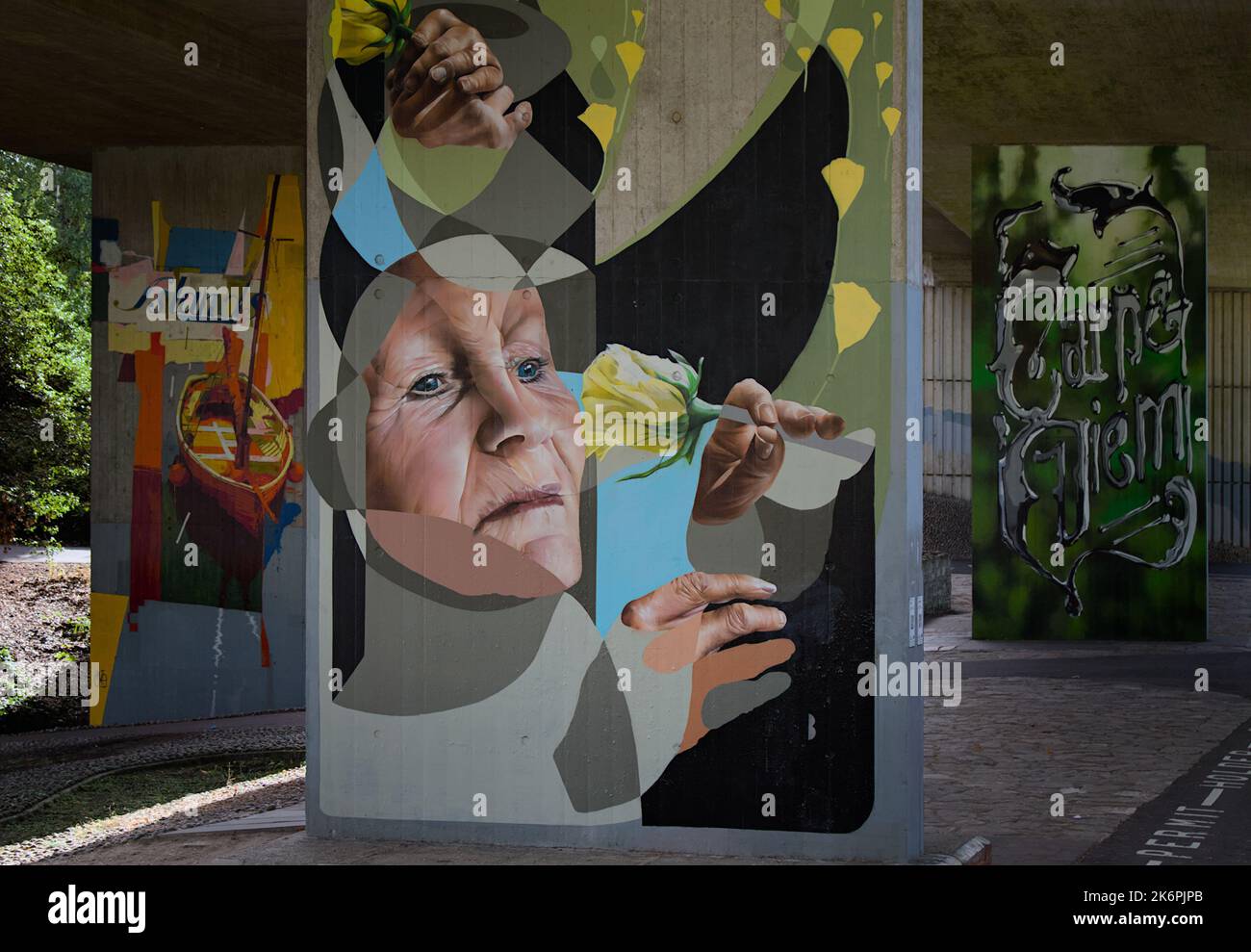 Art Murals, Paintings On Concrete Pillars Under An Overpass As Part Of The Upside Gallery In Bournemouth UK Stock Photo