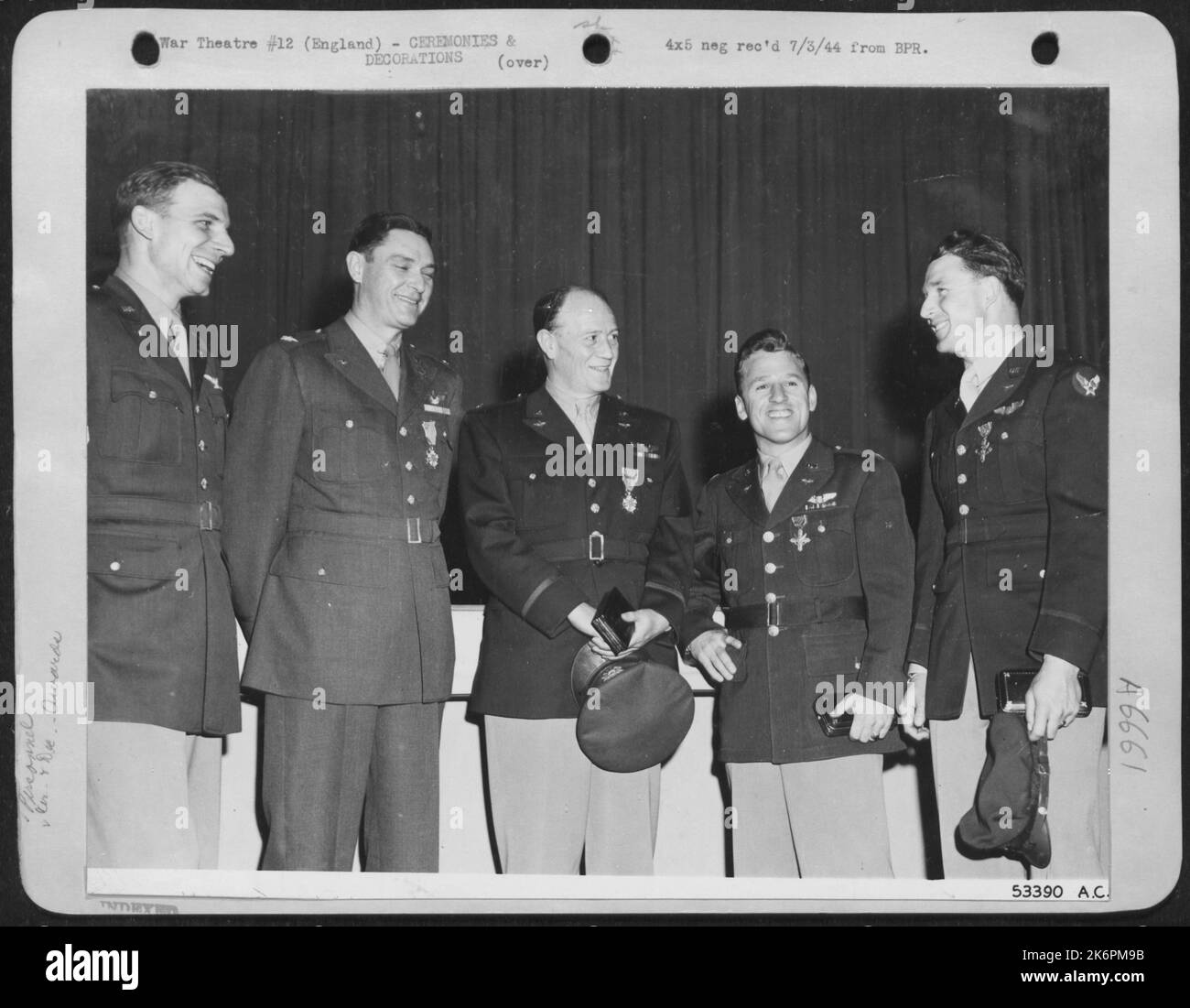 ENGLAND-Officers grouped after the medal presentation. They are left to right: Capt. Francis G. Lauro; Col. Charles M. Taylor; Col. Kenneth R. Collins; Capt. Robert J. Rankin; and Lt. Charles F. Gowder. Stock Photo