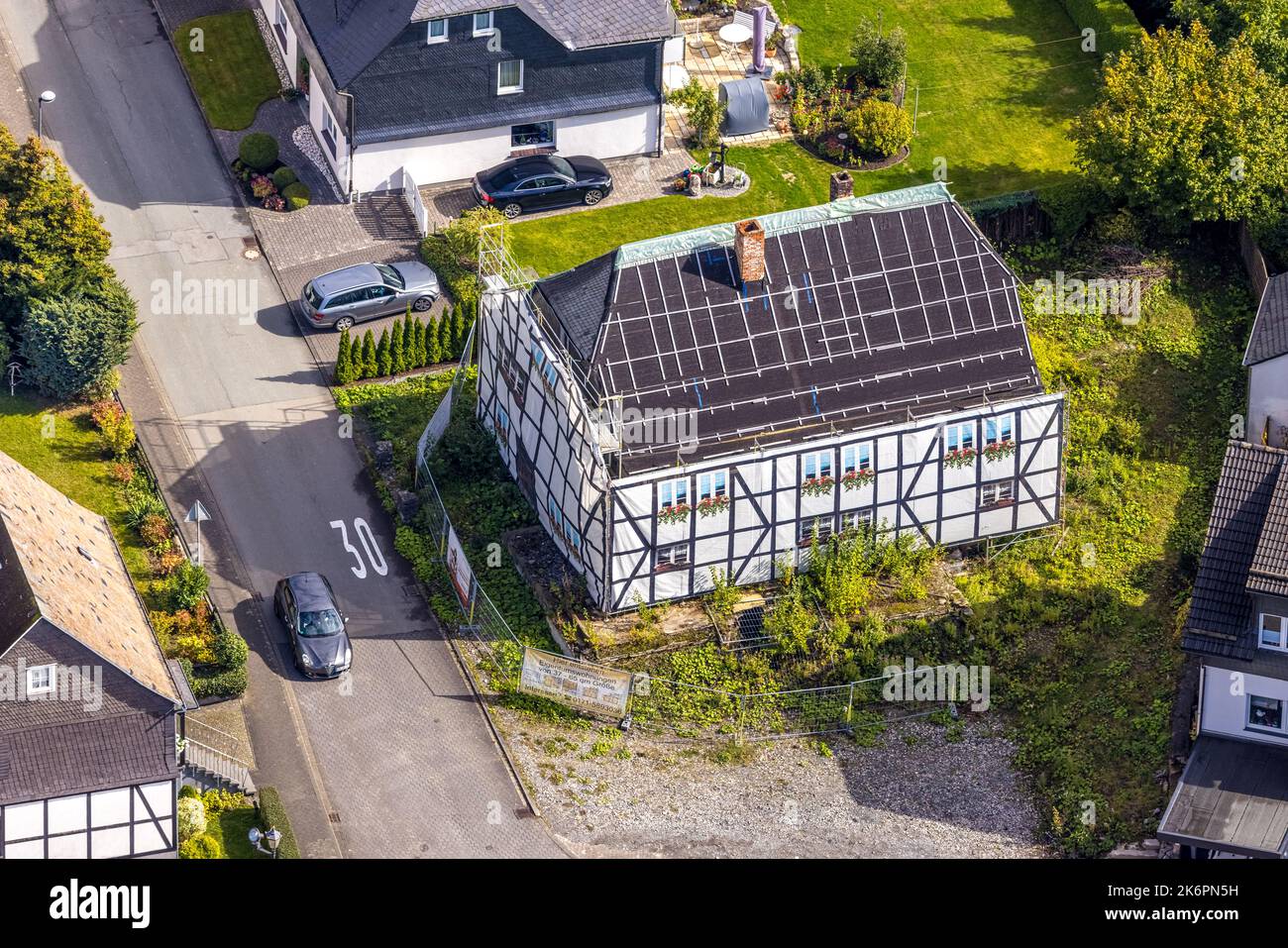 Aerial view, half-timbered house cladding for new construction of condominiums, Ostwig, Bestwig, Ruhr area, North Rhine-Westphalia, Germany, Construct Stock Photo