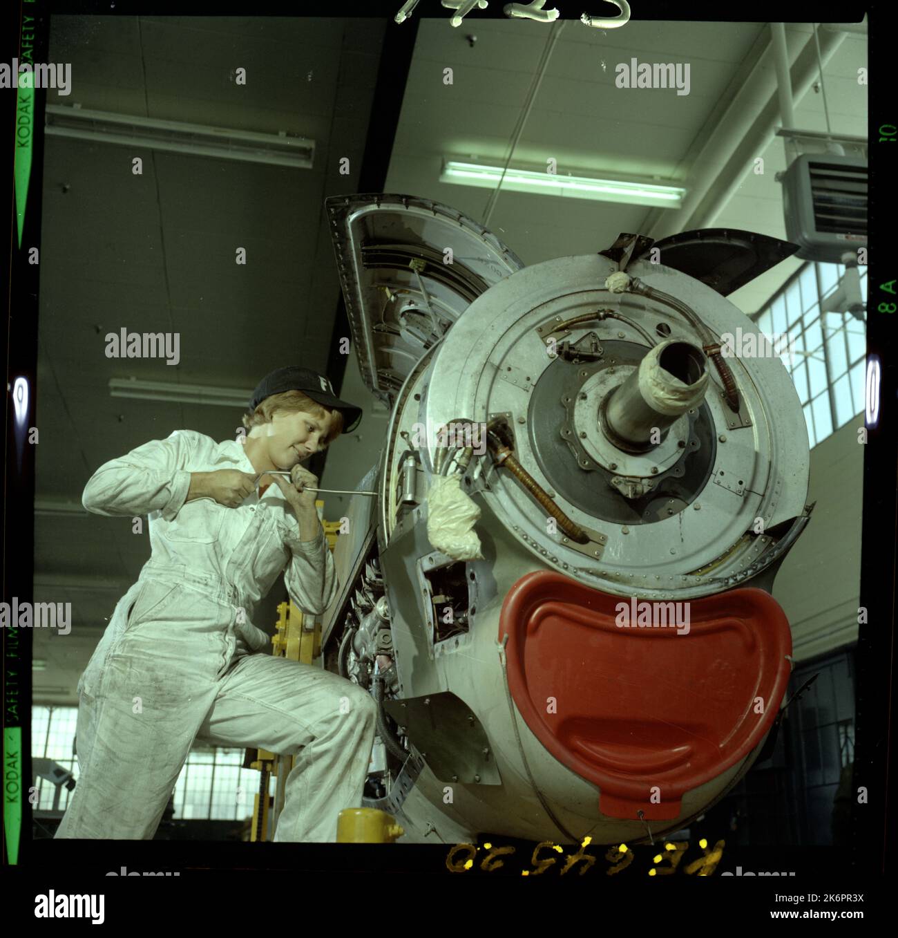 Jet Engine Mechanic Assigned to the 316th Field Maintenance Squadron Makes Repairs on an Engine