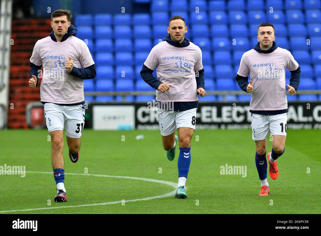 warming up before the FA Cup 4th Qualifying Round match between Oldham Athletic and Chester at Boundary Park, Oldham on Saturday 15th October 2022. (Credit: Eddie Garvey | MI News)James Carragher of Oldham Athletic, Dan Gardner of Oldham Athletic and Luke Burgess of Oldham Athletic warming up before the FA Cup 4th Qualifying Round match between Oldham Athletic and Chester at Boundary Park, Oldham on Saturday 15th October 2022. (Credit: Eddie Garvey | MI News) Credit: MI News & Sport /Alamy Live News Stock Photo