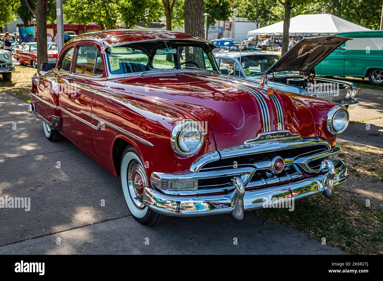 Falcon Heights, MN - June 19, 2022: High perspective front corner view of a 1953 Pontiac Chieftain 2 Door Sedan at a local car show. Stock Photo
