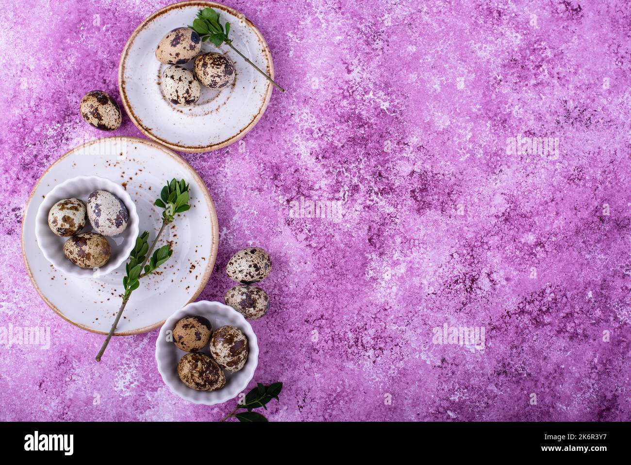 Bowl with quail eggs on light background Stock Photo