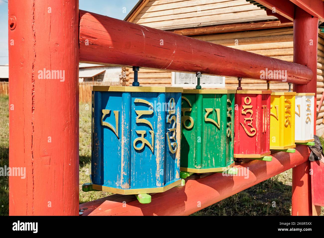 Wooden prayer drums hi-res stock photography and images - Alamy