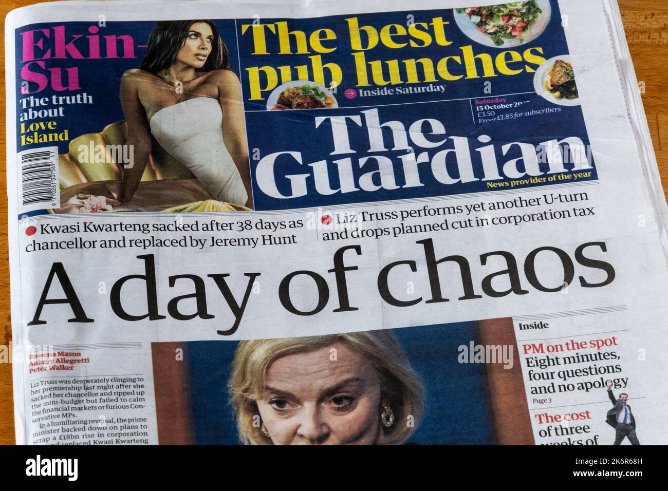 15 October 2022 headline in Guardian reads A day of chaos, following Liz Truss' sacking of Kwasi Kwarteng as Chancellor of the Exchequer. Stock Photo
