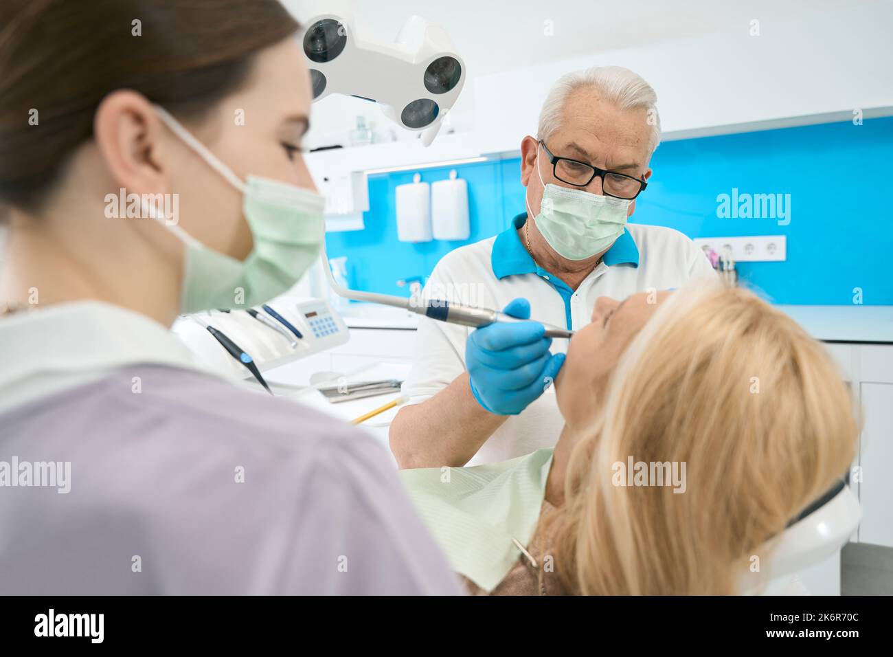 Orthodontist is doing correctly treatment above the oral cavity Stock