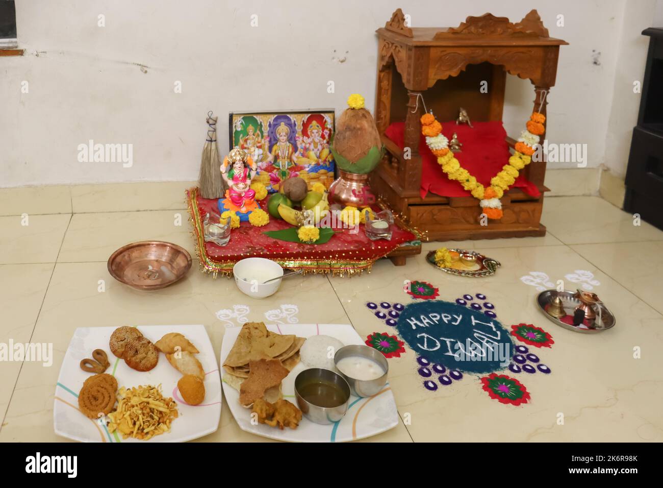 traditional setup of diwali pooja of laxmi, sarswati and ganesh on occassion of laxmi poojan or dhan teras Stock Photo